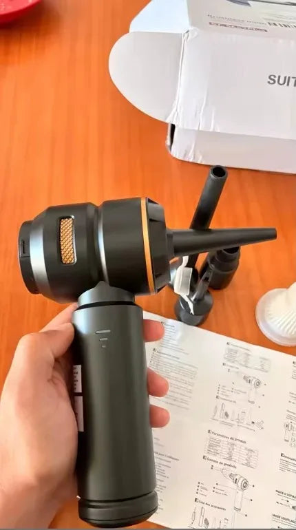 Customer photo of the cordless unit with the blowing nozzle attached next to the instruction sheet